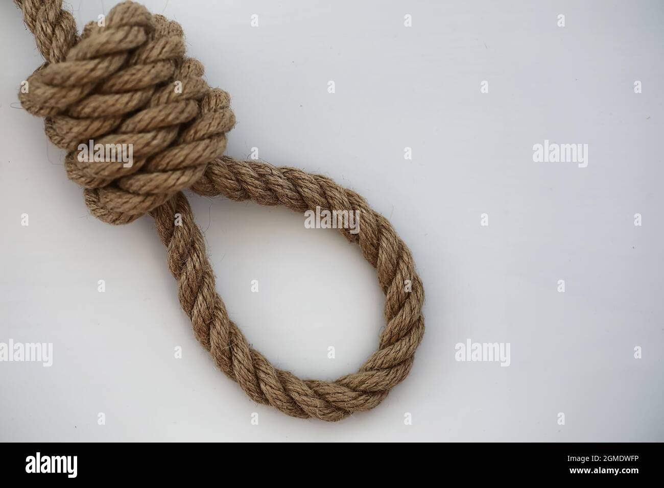 Braided thick rope tied in a skein. Hemp rope for decoration and design.  Background from fishing rope Stock Photo - Alamy