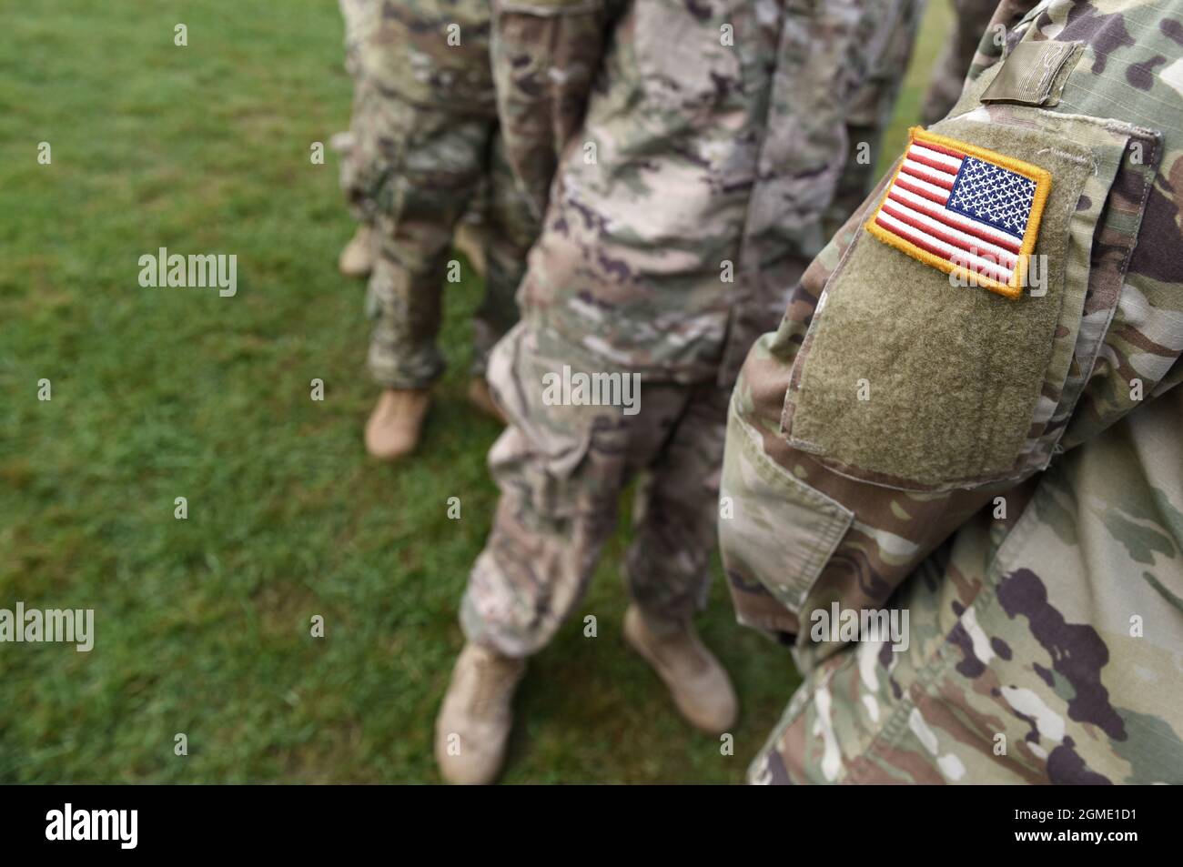 US soldiers. US army. USA patch flag on the US military uniform. Veterans Day. Memorial Day. Stock Photo