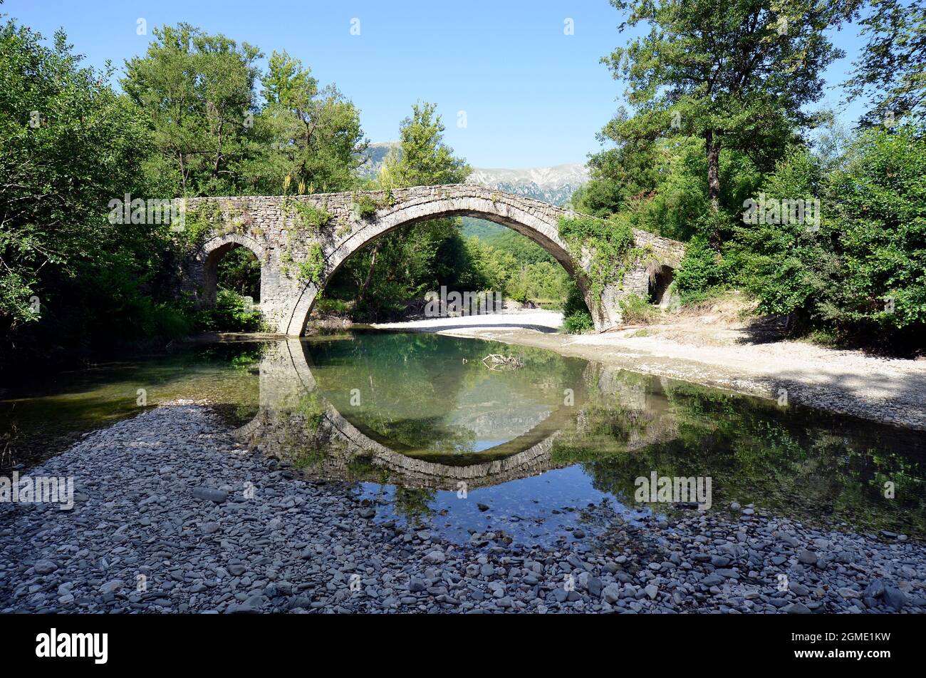 Greece, ancient stone bridge Kamber Aga aka Kamper Aga crossing Zagoritikos river Stock Photo
