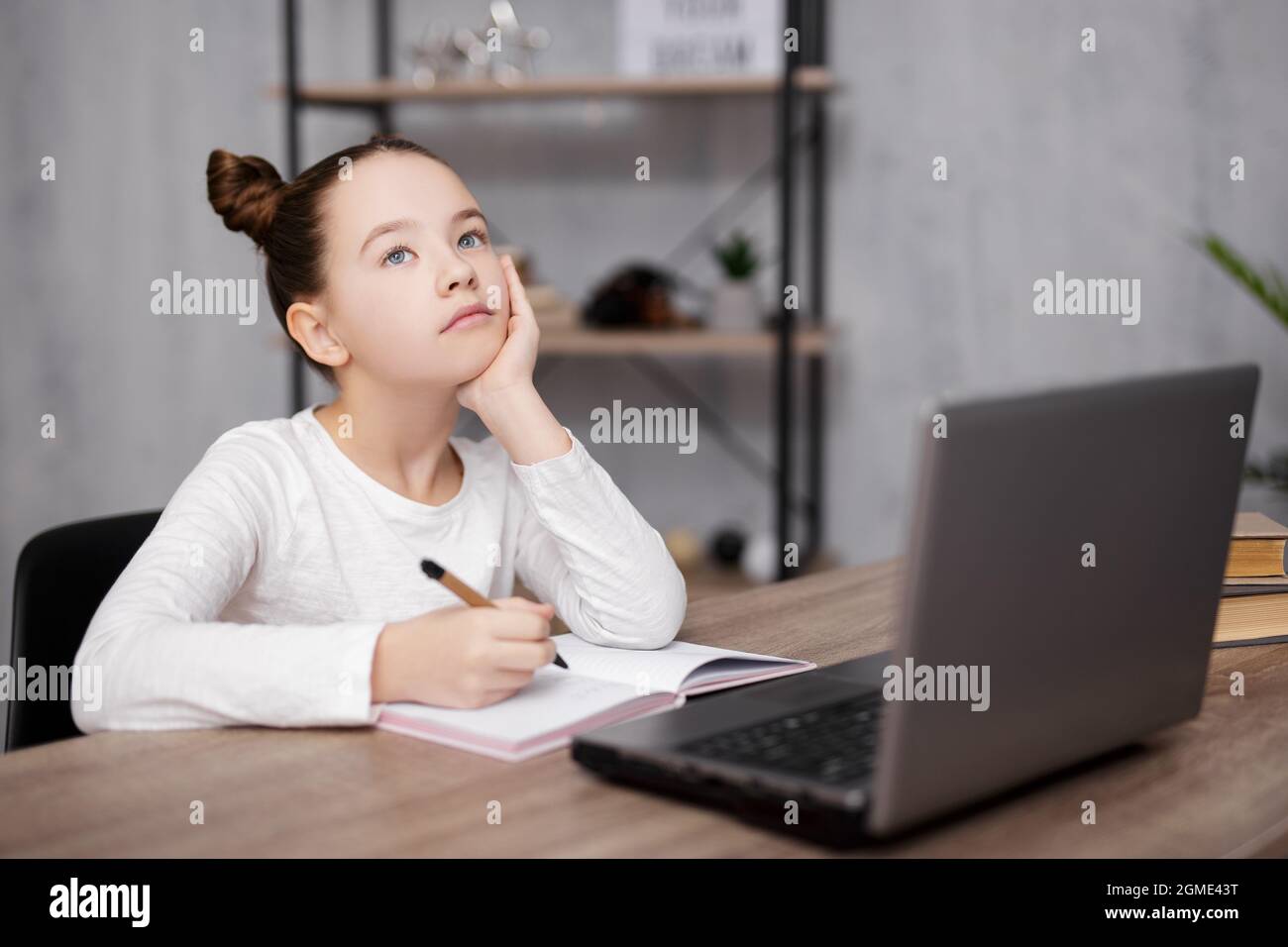 school, homework and distance education concept - portrait of bored or ...