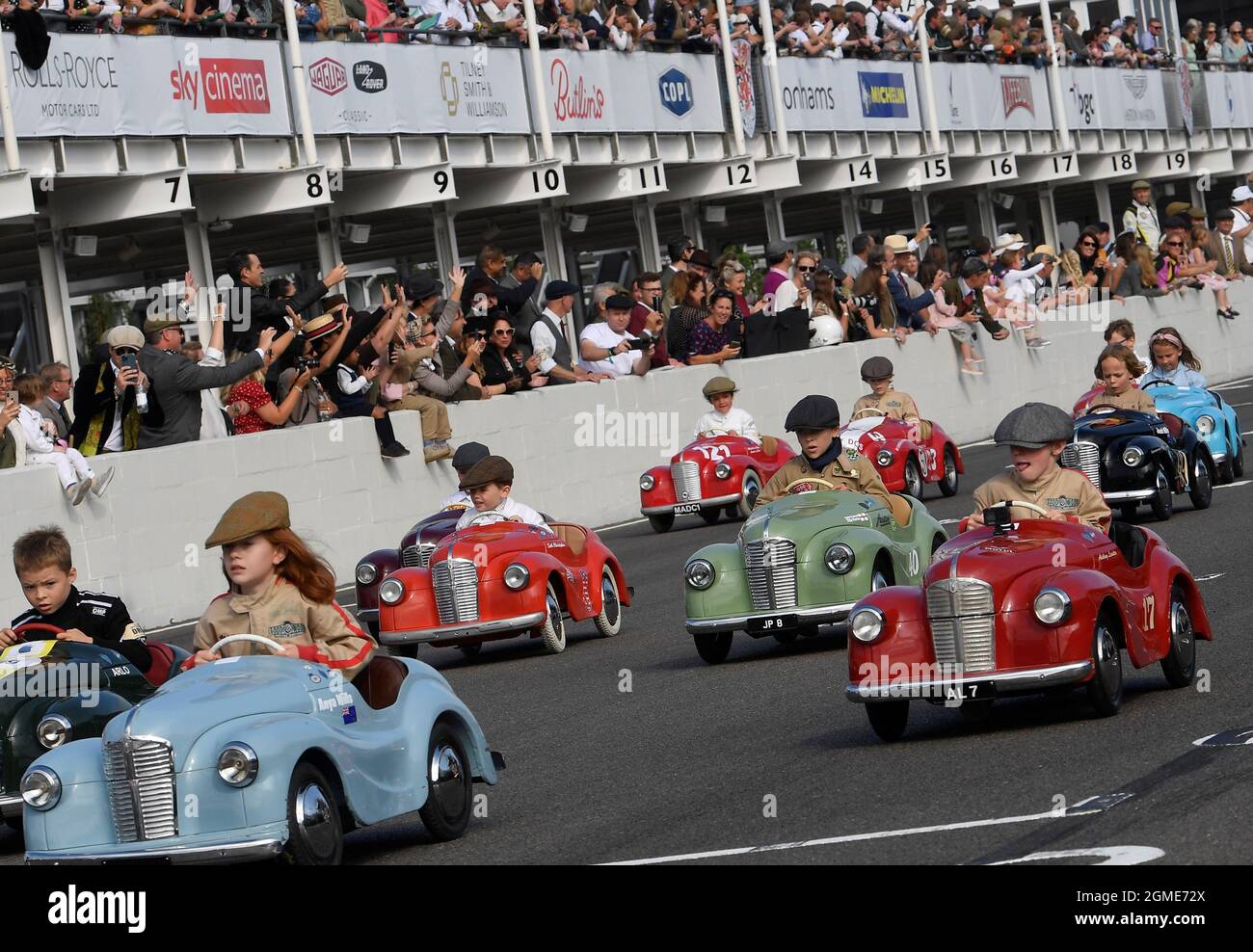 Children take part in the Settrington Cup Pedal Car Race as motoring  enthusiasts attend the Goodwood Revival, a three-day historic car racing  festival in Goodwood, Chichester, southern Britain, September 18, 2021.  REUTERS/Toby
