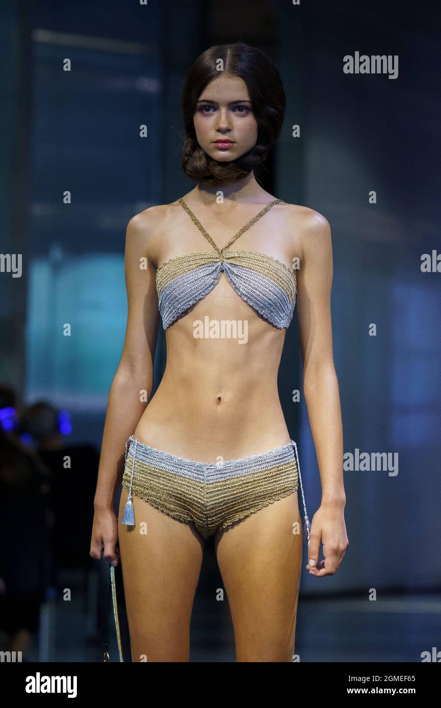 Madrid, Spain. 18th Sep, 2021. A model walks the runway at the