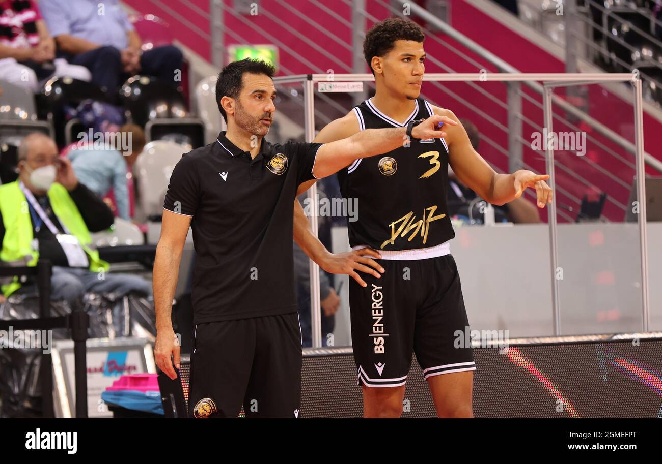 Bonn, Germany. 17th Sep, 2021. Telekom Dome, Basketball, preseason game,  Telekom Baskets Bonn vs Basketball Loewen Braunschweig: Headcoach Jesus  Ramirez (Braunschweig), Nicholas Tischler (Braunschweig) gestures. Credit:  Juergen Schwarz/Alamy Live News ...