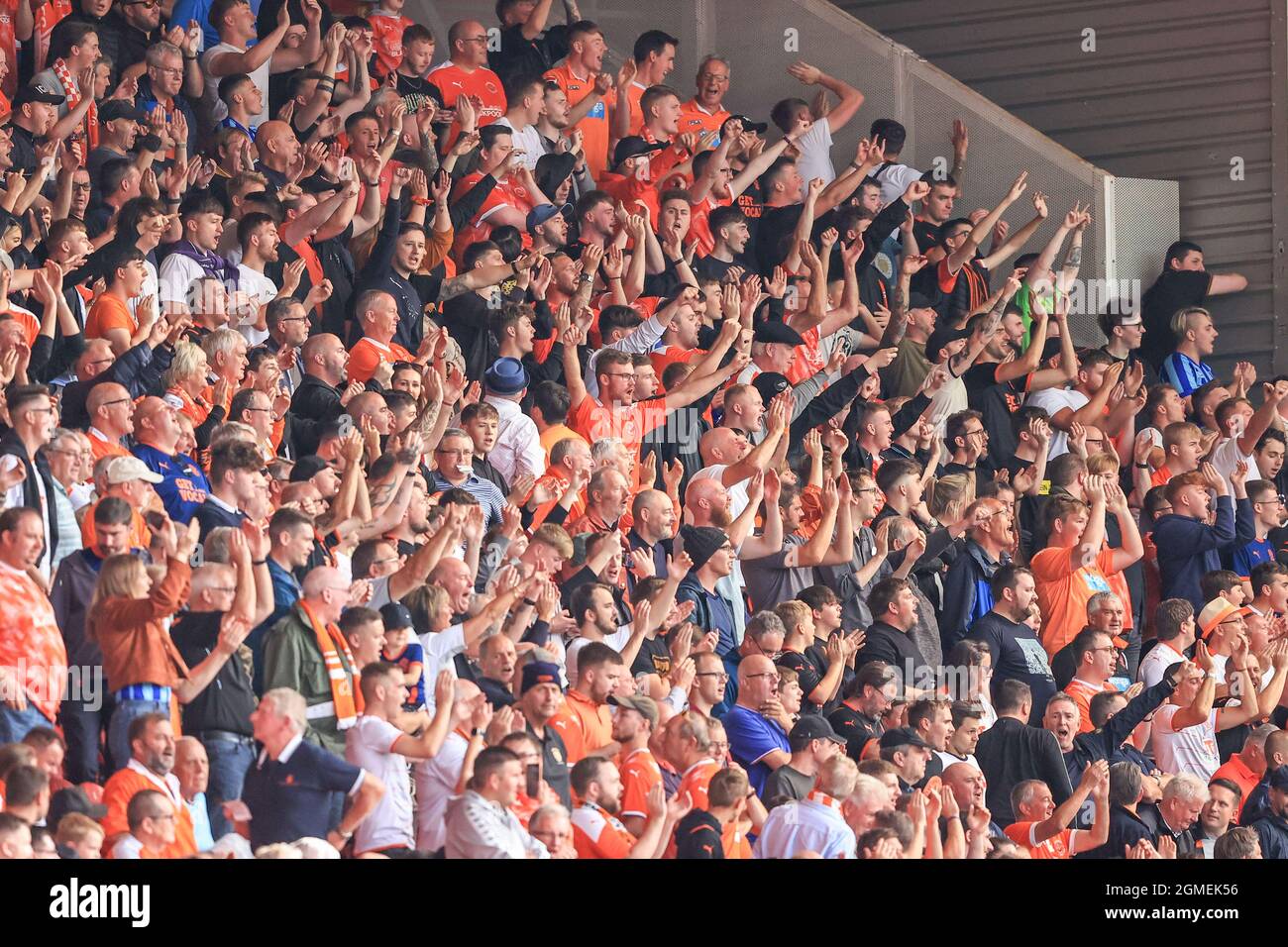 Blackpool fans signing away before kickoff Stock Photo Alamy