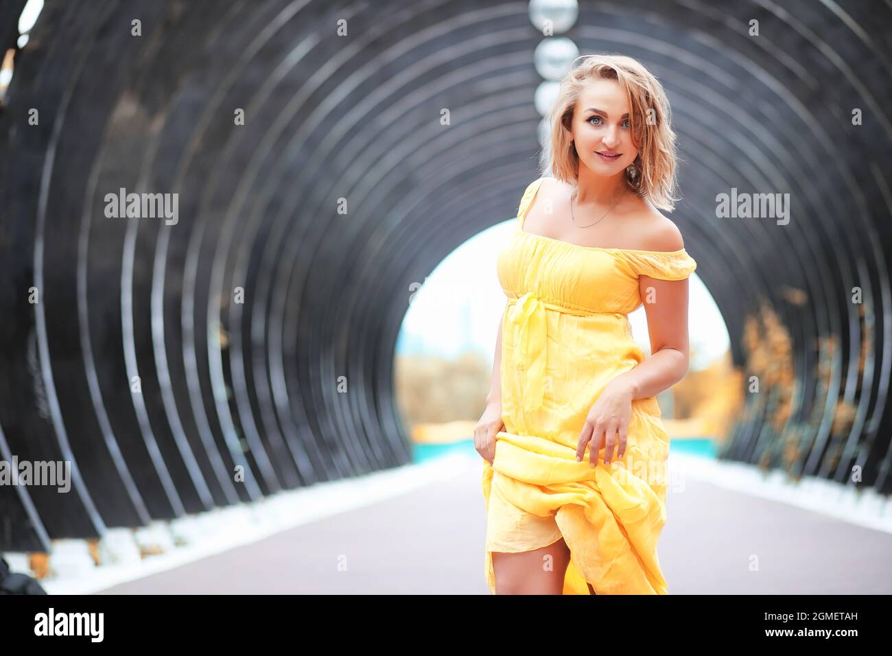 Beautiful girl in the park on a autumn sunny day walk Stock Photo - Alamy