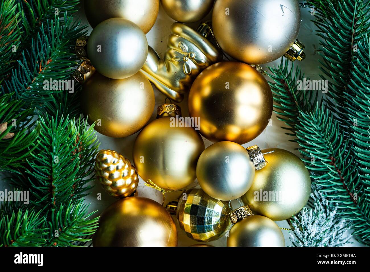 Christmas card concept with fir tree branches and golden xmas balls ...