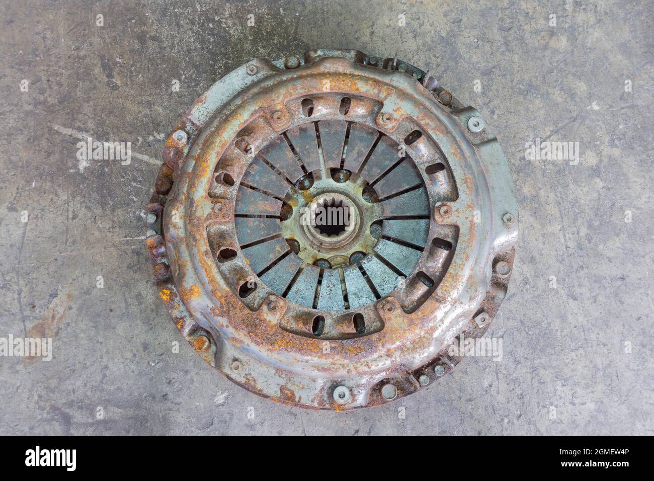 Old and rusty clutch pressure plate assembly with clutch disc plate and