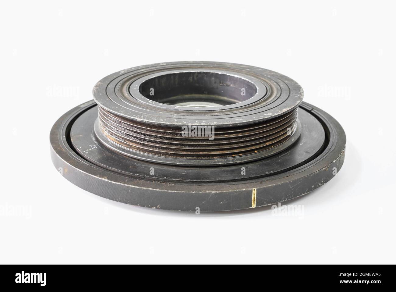 Old used car engine pulley o white background Stock Photo Alamy
