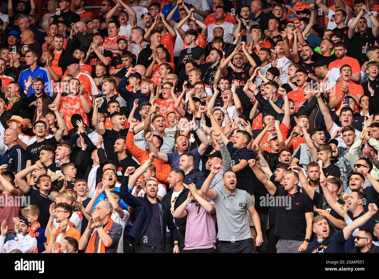 Blackpool fans sing away Stock Photo Alamy