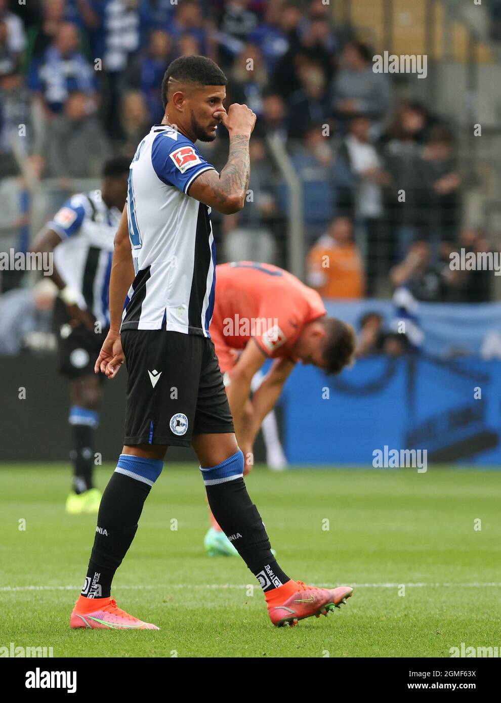 Bielefeld, Germany. 18th Sep, 2021. Football: Bundesliga, Arminia Bielefeld  - TSG 1899 Hoffenheim, Matchday 5 at Schüco Arena. Bielefeld's new signing  Andres Andrade touches his nose. Credit: Friso Gentsch/dpa - IMPORTANT NOTE: