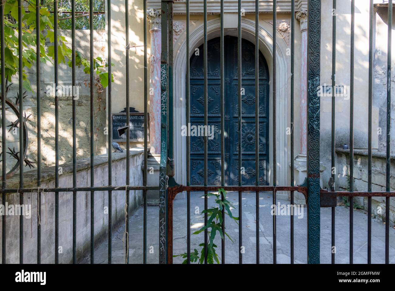 Entrance to Chapelle Sainte Croix, Avignon France. Stock Photo