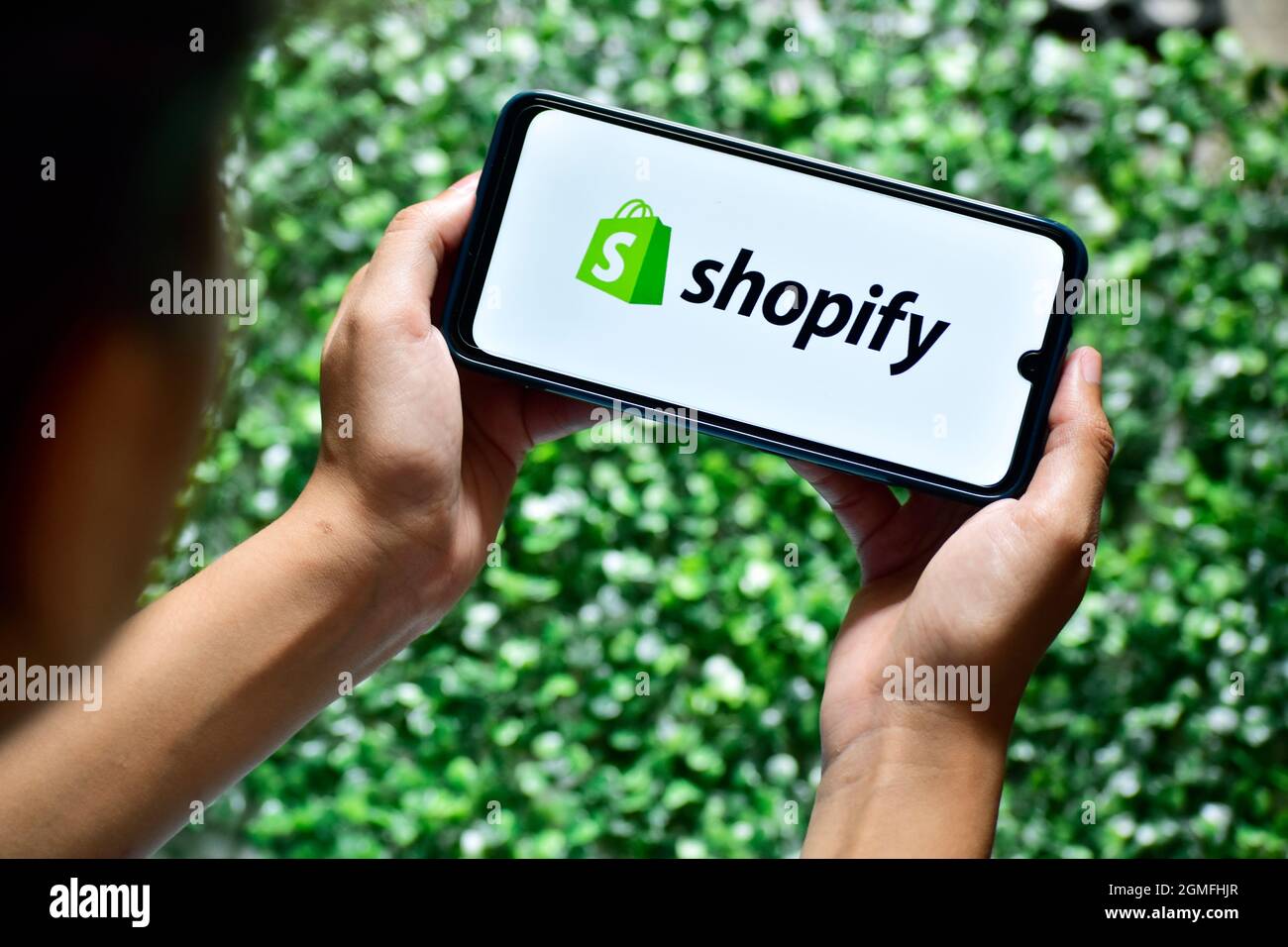 New Delhi, India - September 13, 2019: Shopify application on smartphone, ecommerce app Stock Photo