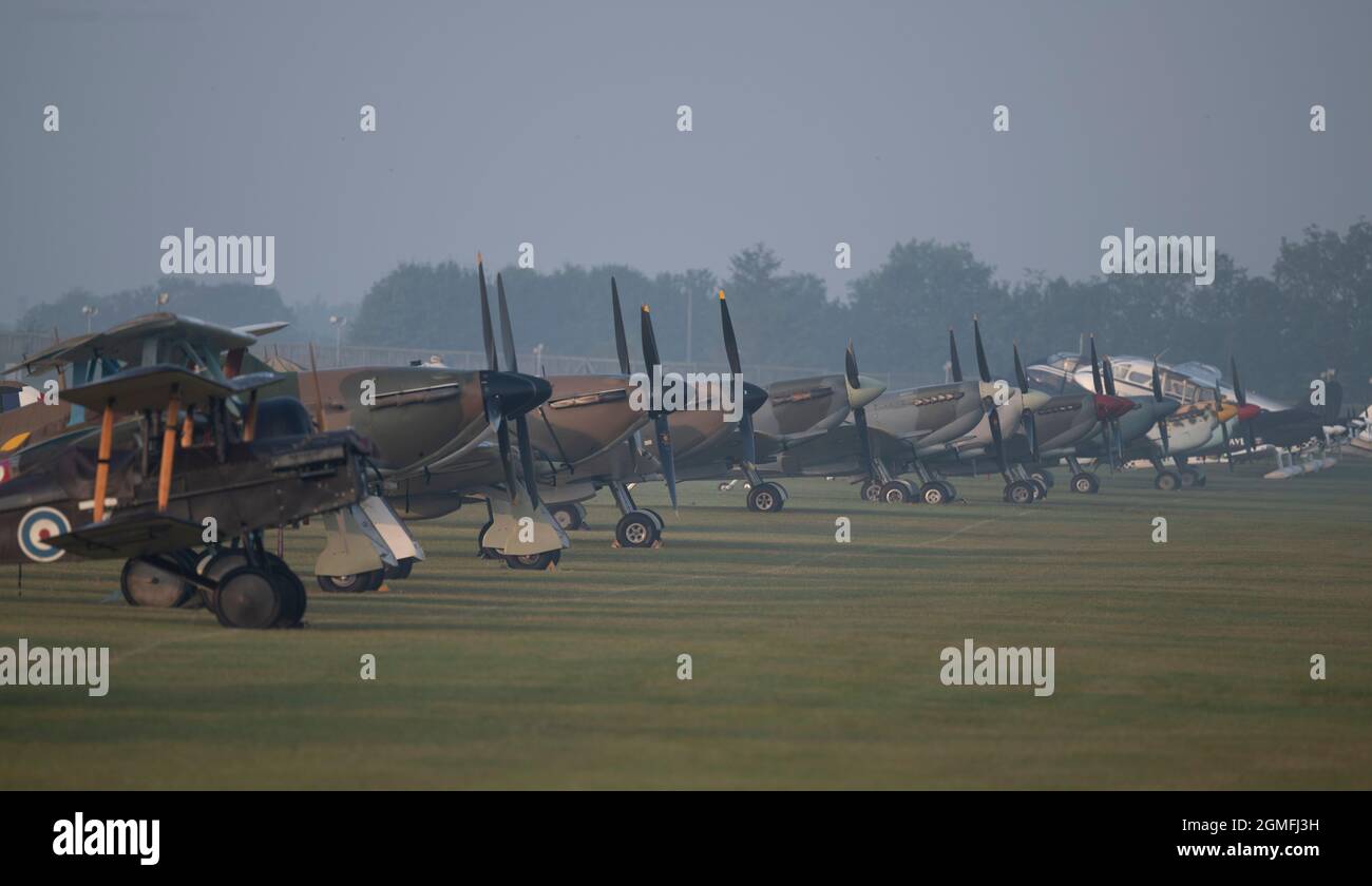 IWM Duxford, Cambridgeshire, UK. 18 September 2021. The Battle of Britain Air Show takes place 18-19 September at Imperial War Museum IWM Duxford, the former RAF site that played a central role in some of the most dramatic days in 20th century history - serving as a base for many of the Spitfire and Hurricane pilots during WWII - with the airshow featuring 1940’s Spitfires and Hurricanes. Credit: Malcolm Park/Alamy Live News Stock Photo