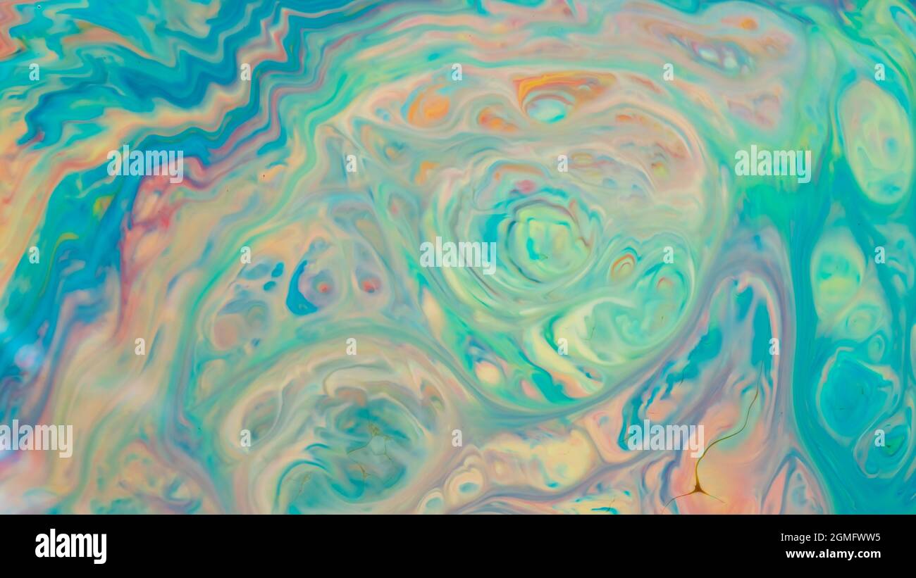 Abstract multicolored liquid background. Abstract ink design template mixed texture background. Psychedelic multicolored pattern. Fluid art Stock Photo