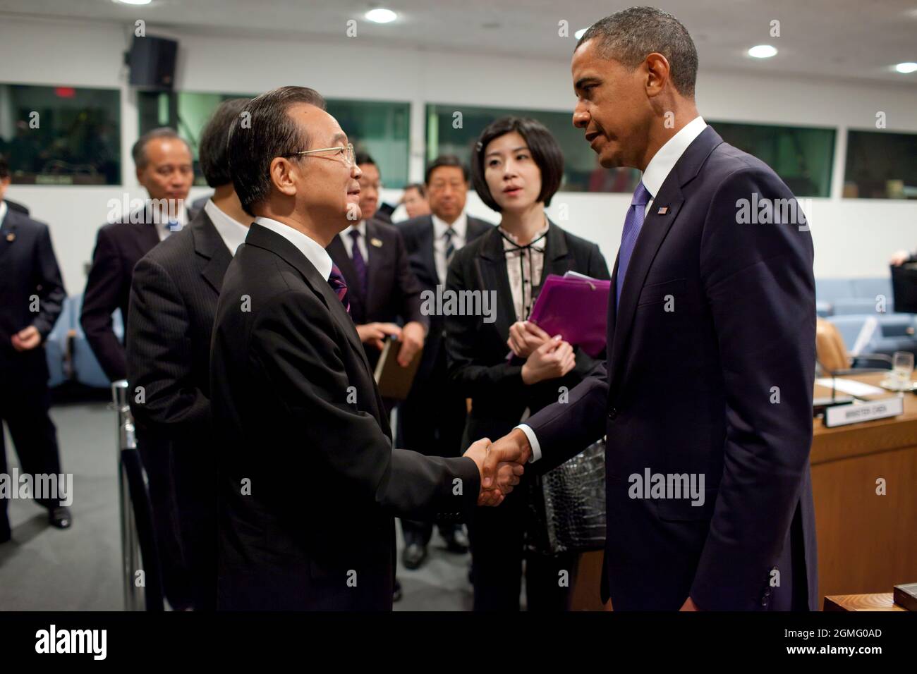 President Barack Obama greets Premier Wen Jiabao and members of the Chinese delegation after a bilateral meeting at the United Nations in New York, N.Y., Sept. 23, 2010. (Official White House Photo by Pete Souza) This official White House photograph is being made available only for publication by news organizations and/or for personal use printing by the subject(s) of the photograph. The photograph may not be manipulated in any way and may not be used in commercial or political materials, advertisements, emails, products, promotions that in any way suggests approval or endorsement of the Presi Stock Photo
