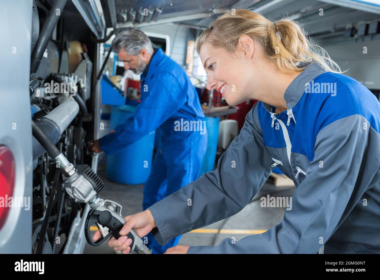 Woman mechanic overalls hi-res stock photography and images - Page 3 - Alamy