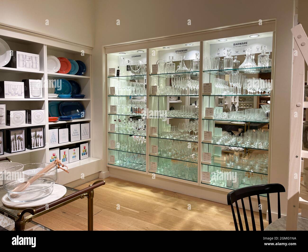 Orlando, FL USA -  September 9, 2021: A display with stemware and barware glasses at a Williams Sonoma store at an indoor mall in Orlando, Florida. Stock Photo