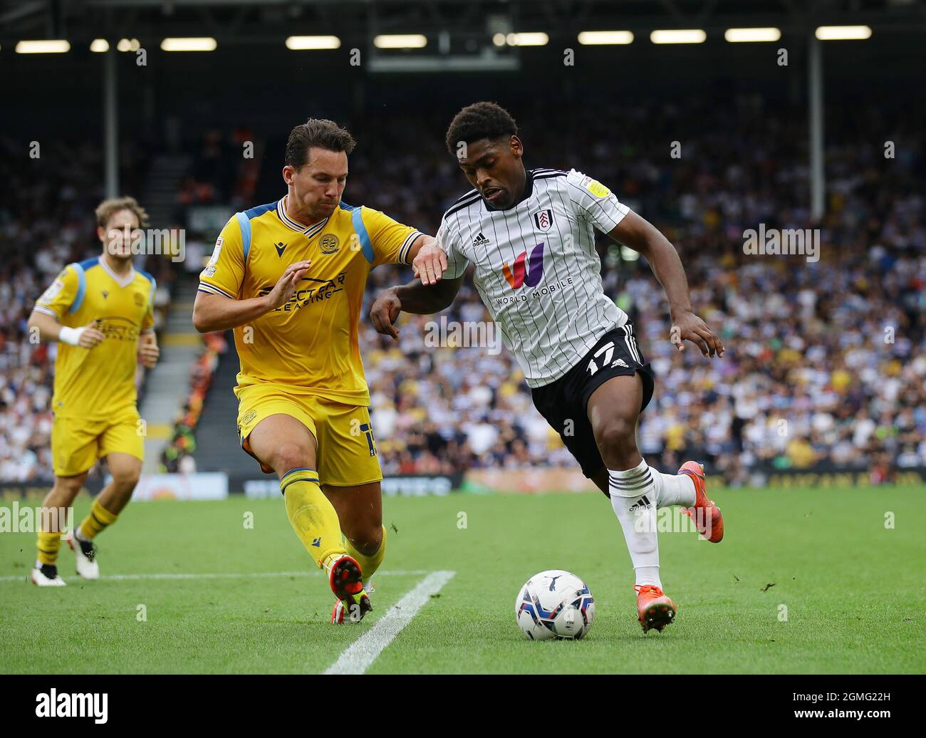 London, England, 18th September 2021. Ivan Cavaleiro of Fulham with Danny Drinkwater of Reading during the Sky Bet Championship match at Craven Cottage, London. Picture credit should read: David Klein / Sportimage Stock Photo