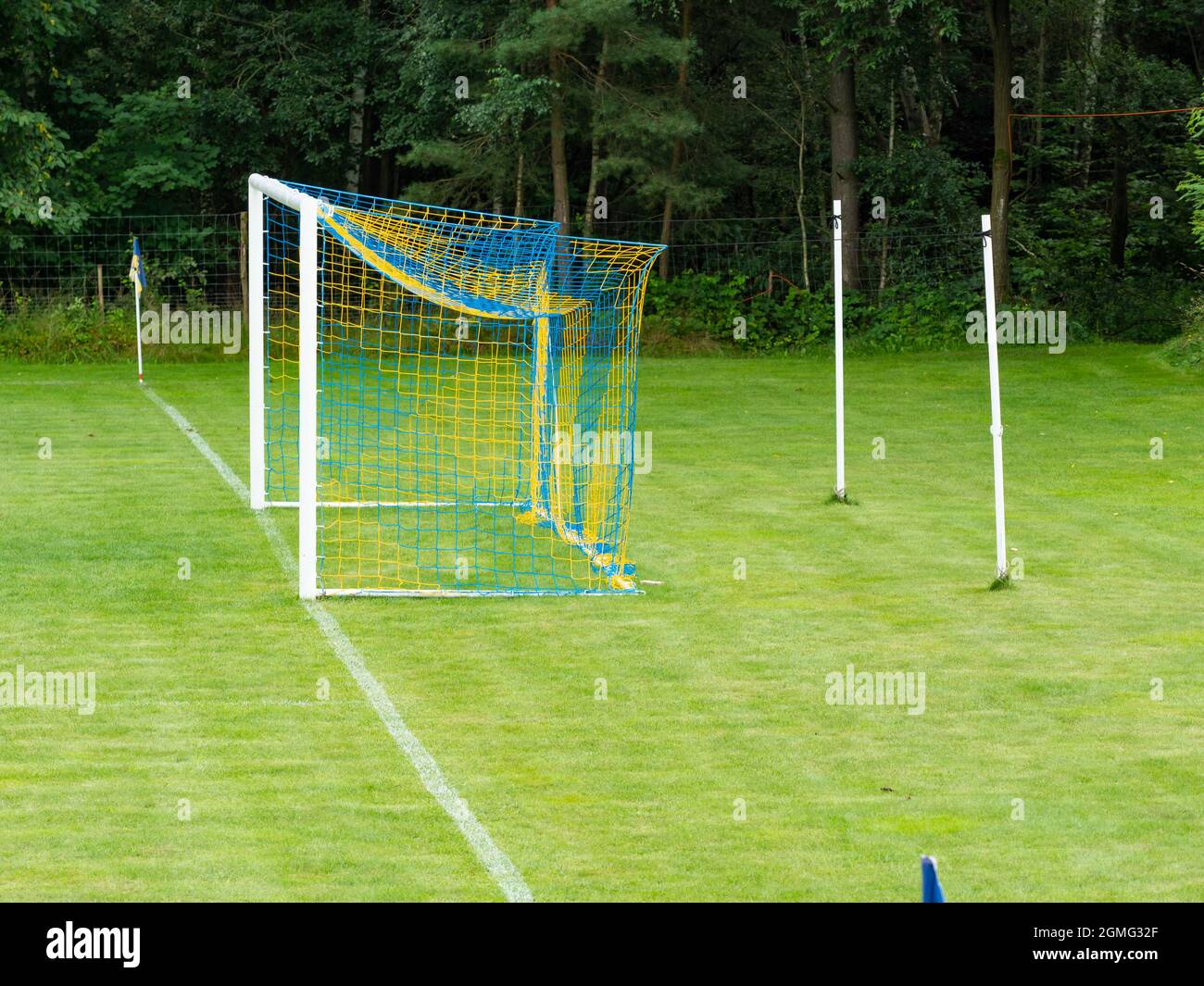 Training soccer field with green turf. Football field with goals and