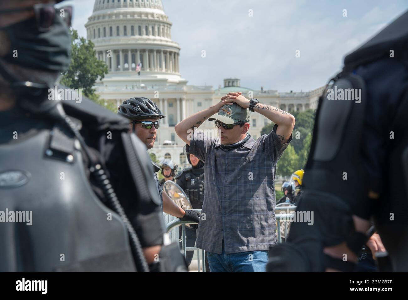 Washington DC, September 18, 2021, USA: An unidentified man was arrested by US Capitol police as the Justice for J6 rally was ending.  The cause of th Stock Photo