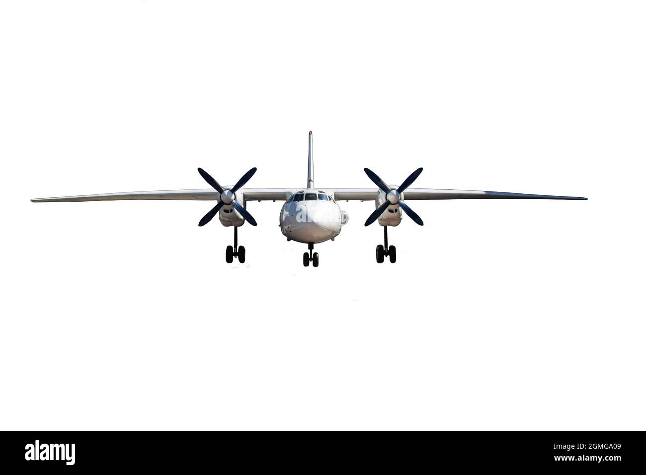 A twin-engined passenger plane on a clean white clipping background photographed from the front. Chassis released Stock Photo