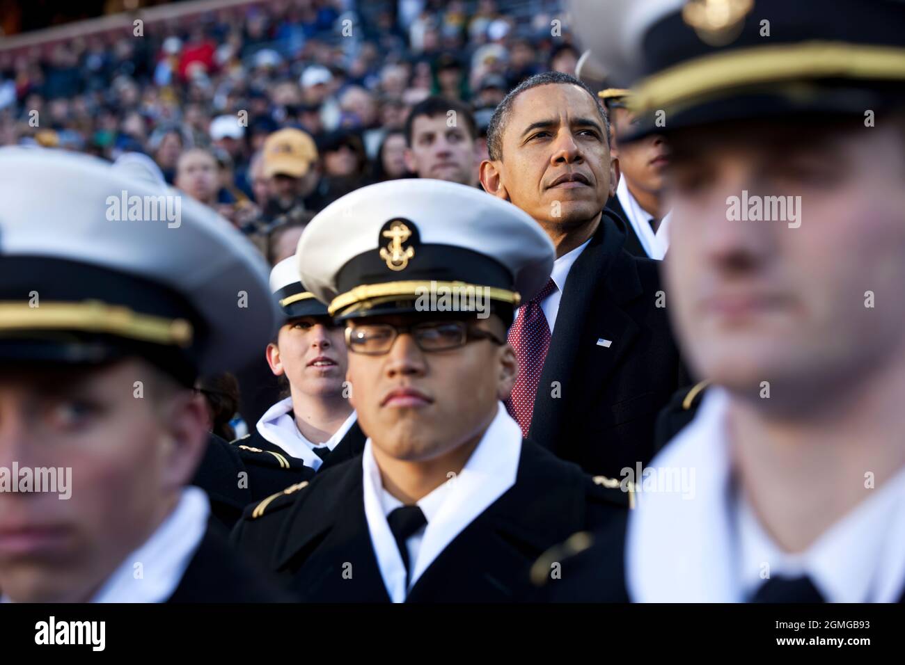 President Barack Obama watches the first half of the annual Army vs. Navy football game with U.S. Naval Academy Midshipman at FedEx Field in Landover, Md., Saturday, Dec. 10, 2011. (Official White House Photo by Pete Souza) This official White House photograph is being made available only for publication by news organizations and/or for personal use printing by the subject(s) of the photograph. The photograph may not be manipulated in any way and may not be used in commercial or political materials, advertisements, emails, products, promotions that in any way suggests approval or endorsement o Stock Photo