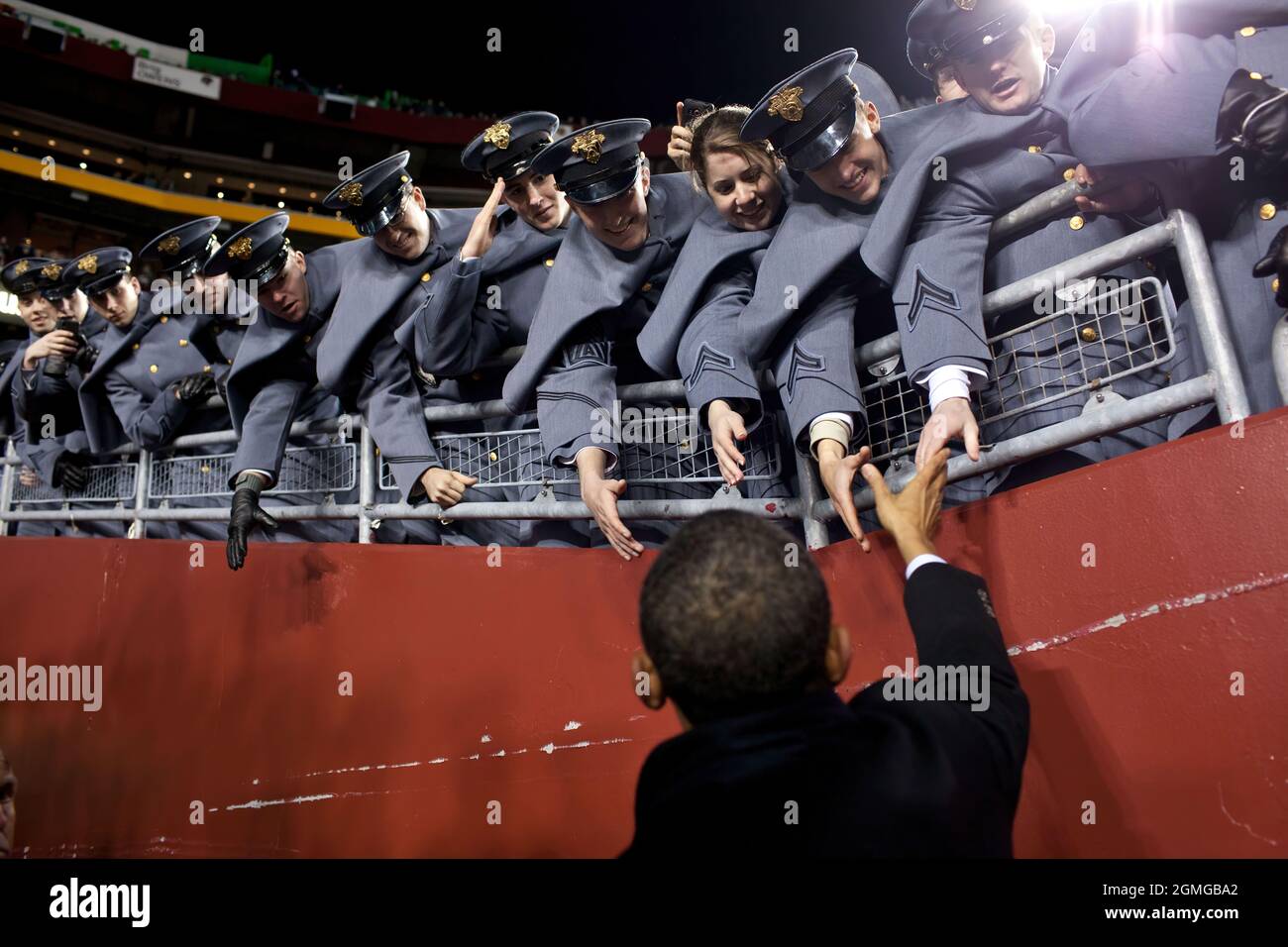 President Barack Obama greets U.S. Military Academy Cadets during the annual Army vs. Navy football game at FedEx Field in Landover, Md., Saturday, Dec. 10, 2011. (Official White House Photo by Pete Souza) This official White House photograph is being made available only for publication by news organizations and/or for personal use printing by the subject(s) of the photograph. The photograph may not be manipulated in any way and may not be used in commercial or political materials, advertisements, emails, products, promotions that in any way suggests approval or endorsement of the President, t Stock Photo