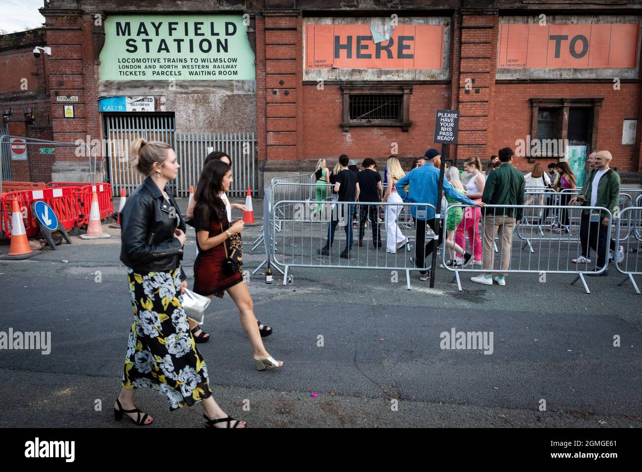 Manchester, UK. 18th Sep, 2021. People arrive at the Repercussion Festival.ÊThe new day and night event sees the further regeneration of Mayfield that is host to over five stages, including the legendary Star & Garter pub. Credit: Andy Barton/Alamy Live News Stock Photo