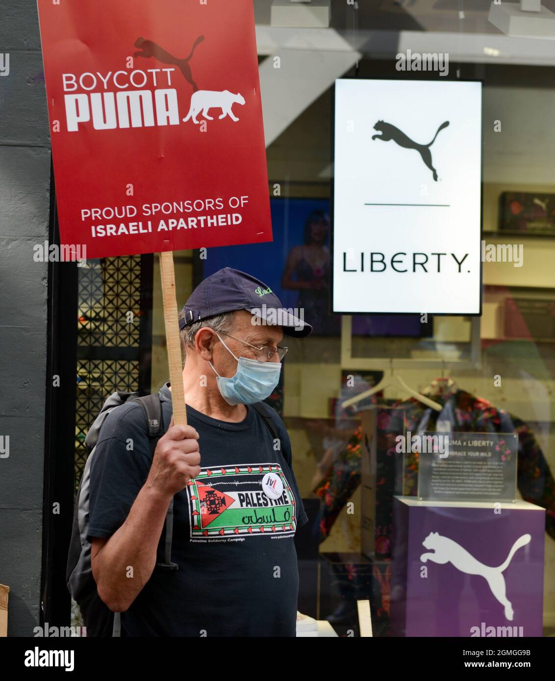 A protestor holding a placard expressing his opinion, during the demonstration.Boycott Puma protest organised by Palestine Solidarity Campaign and FOA (Friends of Al Aqsa) at Puma flagship store on Carnaby Street, London. Activists demonstrated against Puma's sponsorship of the IFA (Israel Football Association). (Photo by Thomas Krych / SOPA Images/Sipa USA) Stock Photo
