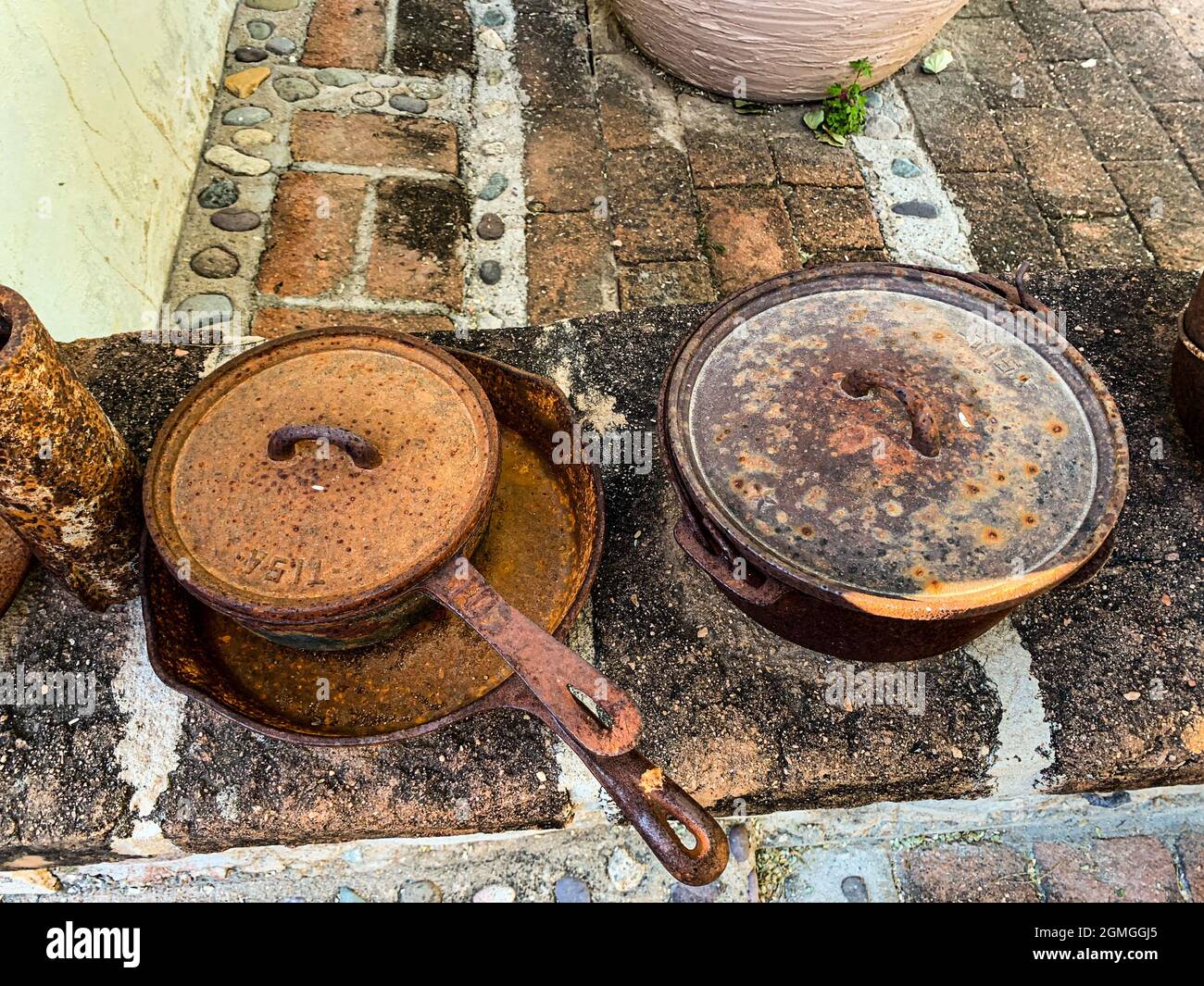 Reddish steel pans by rusted metal in the kitchen of Hacienda del Labrador  in the town of Ures, Sonora, Mexico. real state, Hacienda Labrador,  history, ranches and haciendas of Mexico, Mexican style,