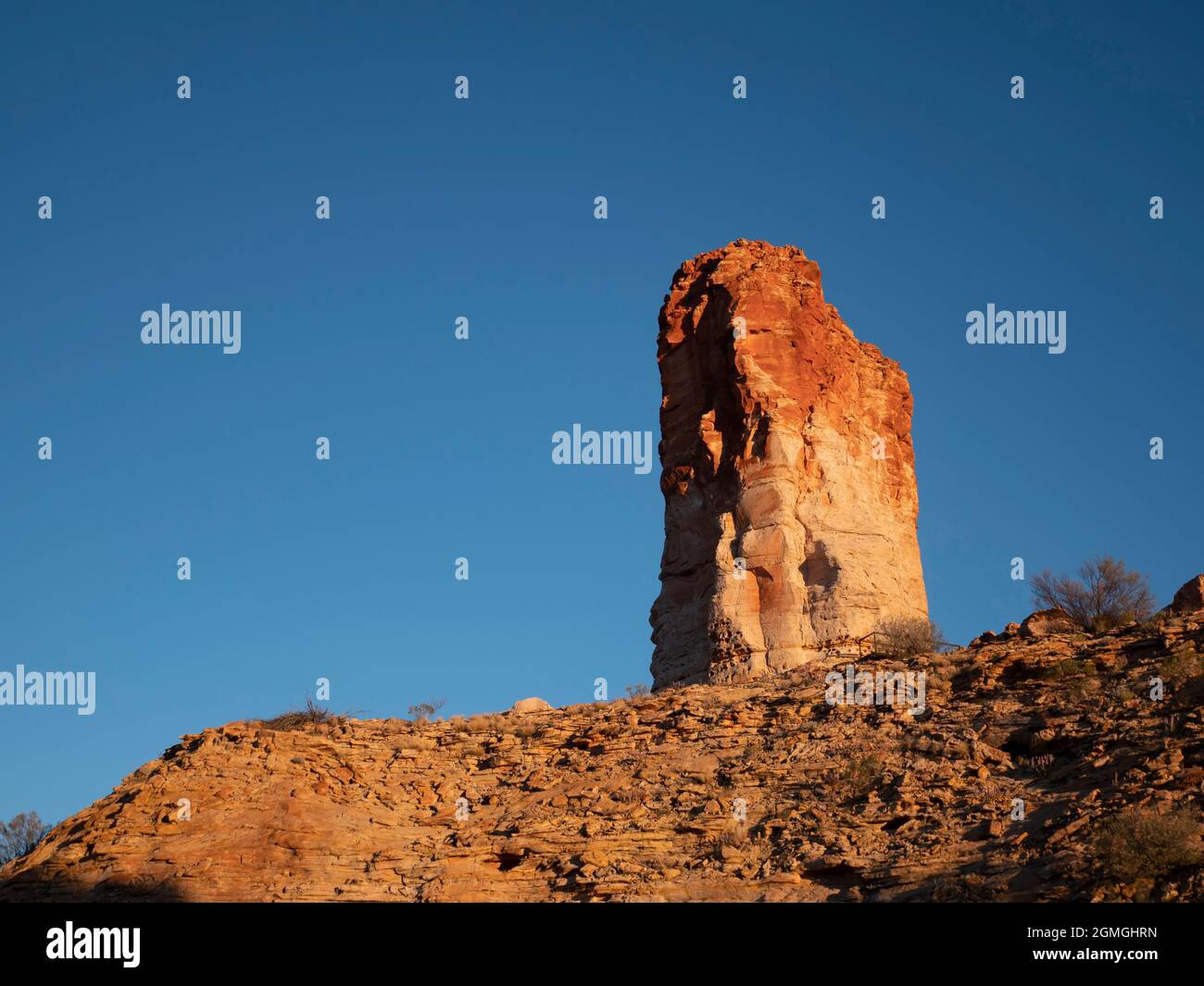 Chambers Pillar is a historic landmark near Alice Springs in Central Australia. Stock Photo