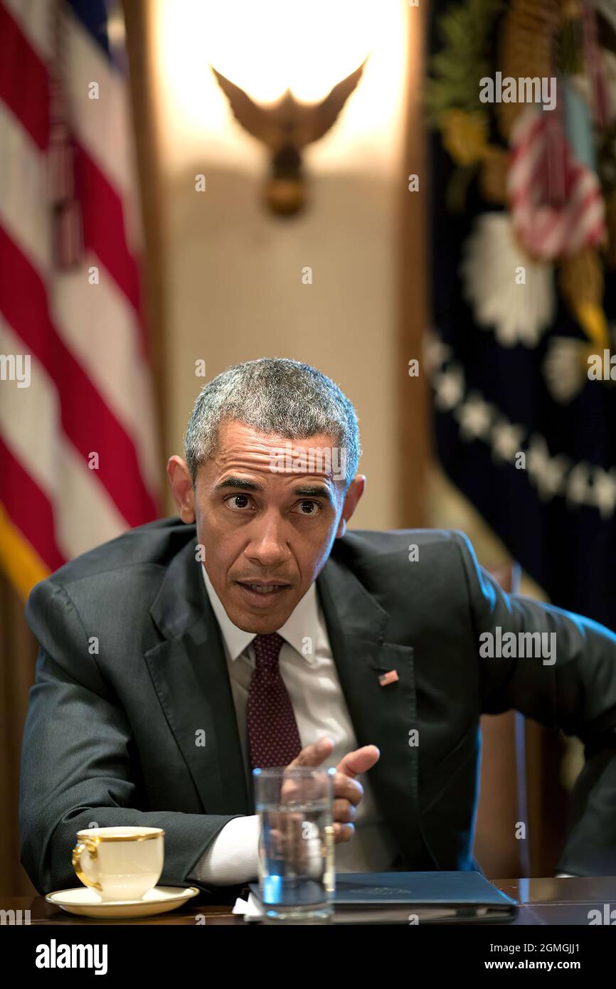 August 4, 2015'The President reacts to a comment during a meeting in the Cabinet Room with American Jewish community leaders to discuss the Iran nuclear agreement.' (Official White House Photo by Pete Souza) This official White House photograph is being made available only for publication by news organizations and/or for personal use printing by the subject(s) of the photograph. The photograph may not be manipulated in any way and may not be used in commercial or political materials, advertisements, emails, products, promotions that in any way suggests approval or endorsement of the President, Stock Photo