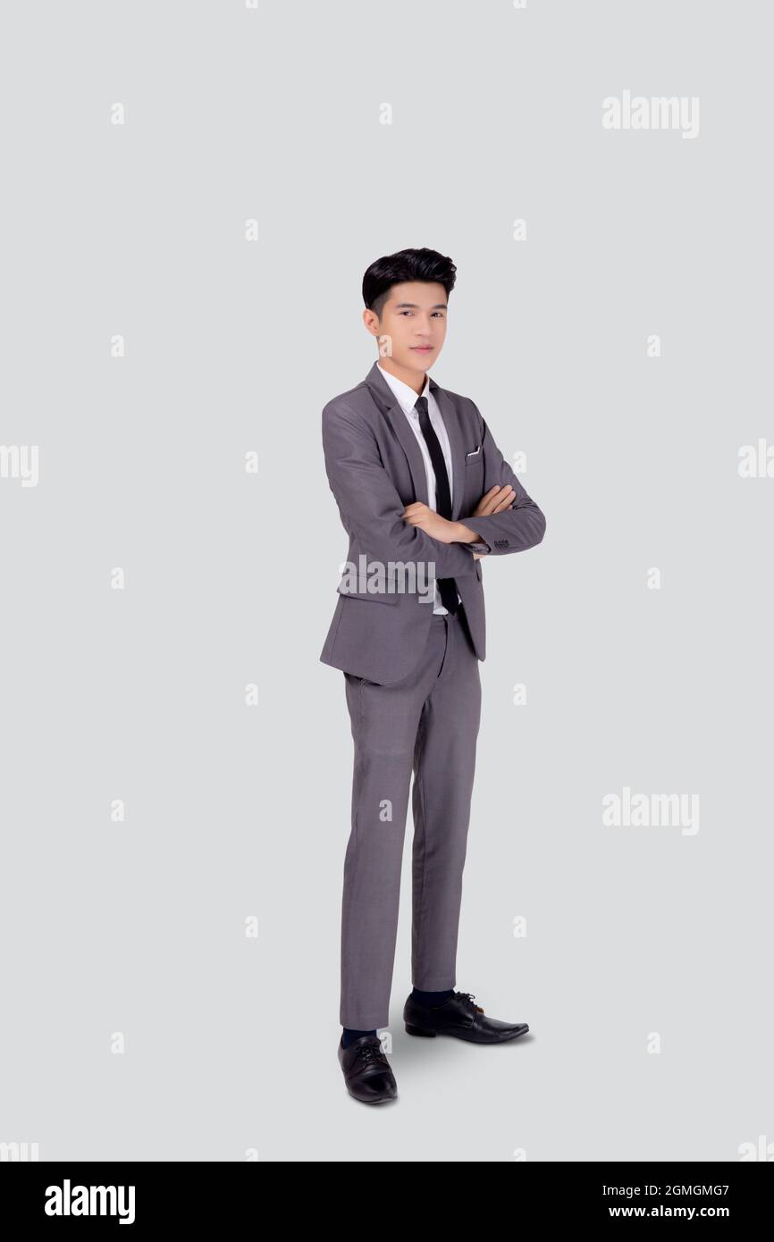 Full length portrait businessman in suit with crossed his arms standing ...