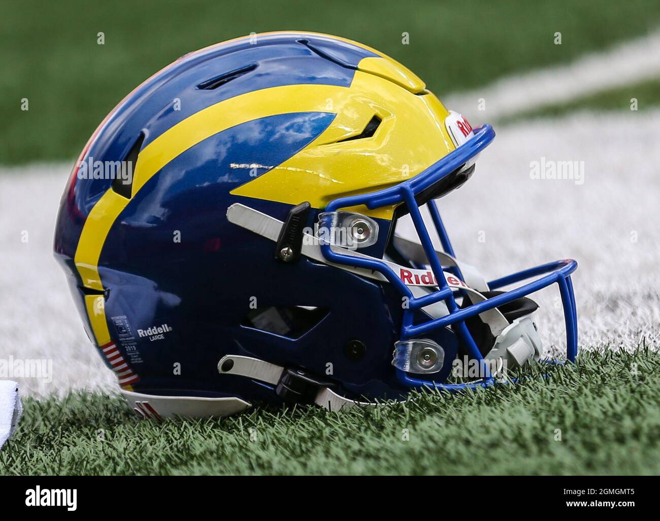 blue hens football helmets Delaware Original Dripping Helmet Yellow T-Shirt by 4 - High Quality Apparels Take your team spirit to the next level with this Sign University of Delaware Official Football