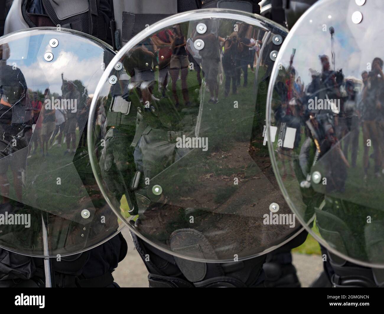 September 18, 2021, Washington, District of Columbia, USA: Participants at the Justice for J6 Rally are reflected in the police shields. Attendance was smaller than predicted with police and journalists outnumbering rally participants. (Credit Image: © Sue Dorfman/ZUMA Press Wire) Stock Photo