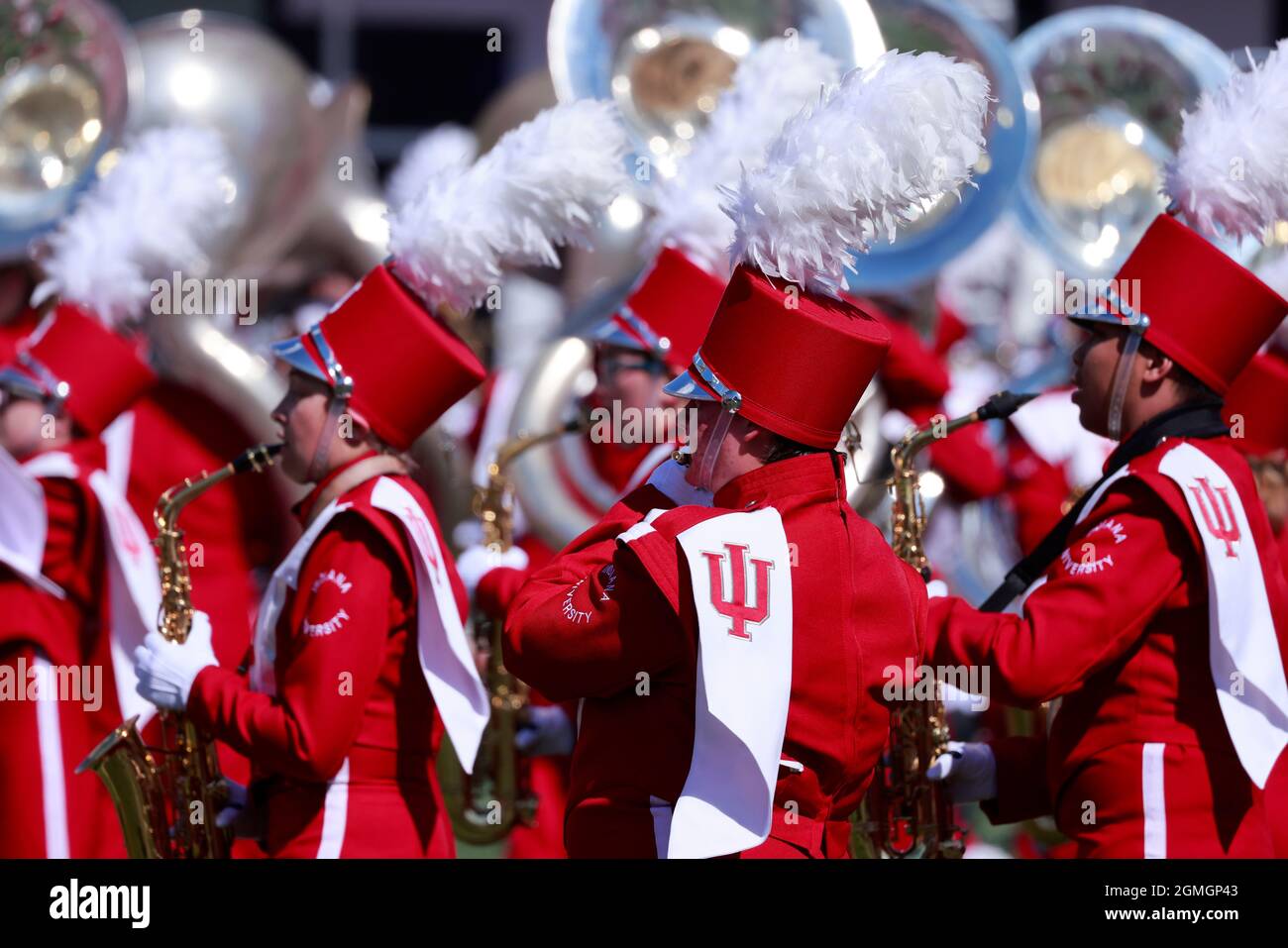 BLOOMINGTON, UNITED STATES – 2021/09/18: Members of the Indiana University Marching 100 march before the Hoosiers play against University of Cincinnati during an NCAA football game on September 18, 2021 at Memorial Stadium in Bloomington, Ind. IU lost to Cincinnati 38-24. Stock Photo