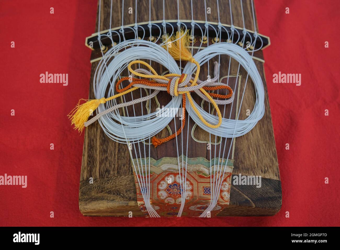 Detail of the Ryubi on a string instrument called Koto, a japanese