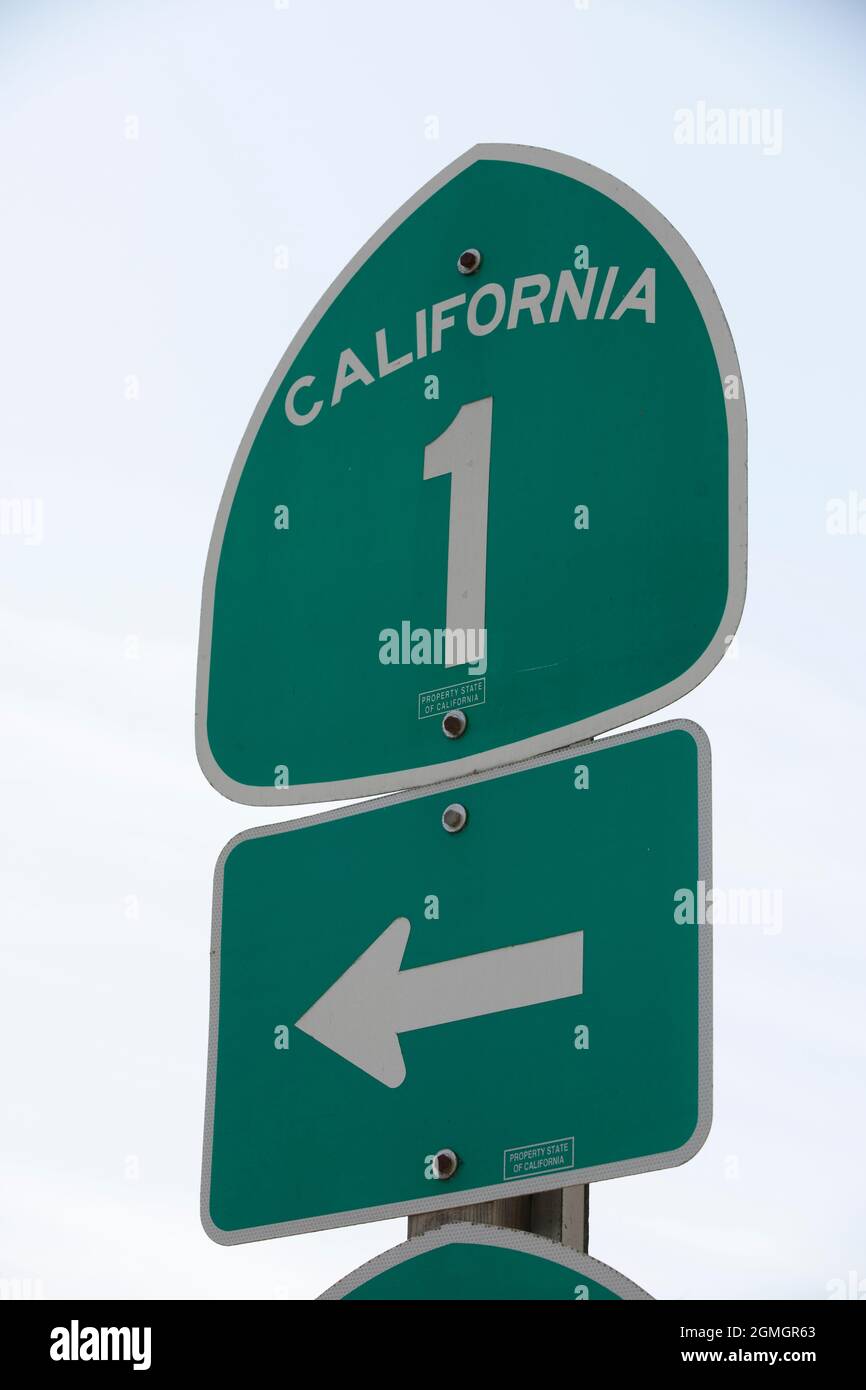 Lompoc, California, USA - July 25, 2021:  Sun shines on a route sign for California 1. Stock Photo