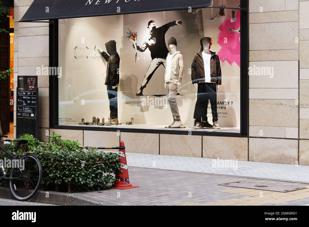 A Barneys New York window display in its Ginza's branch related to a 'Who  is Bansky' exhibition being held in Tokyo Stock Photo - Alamy