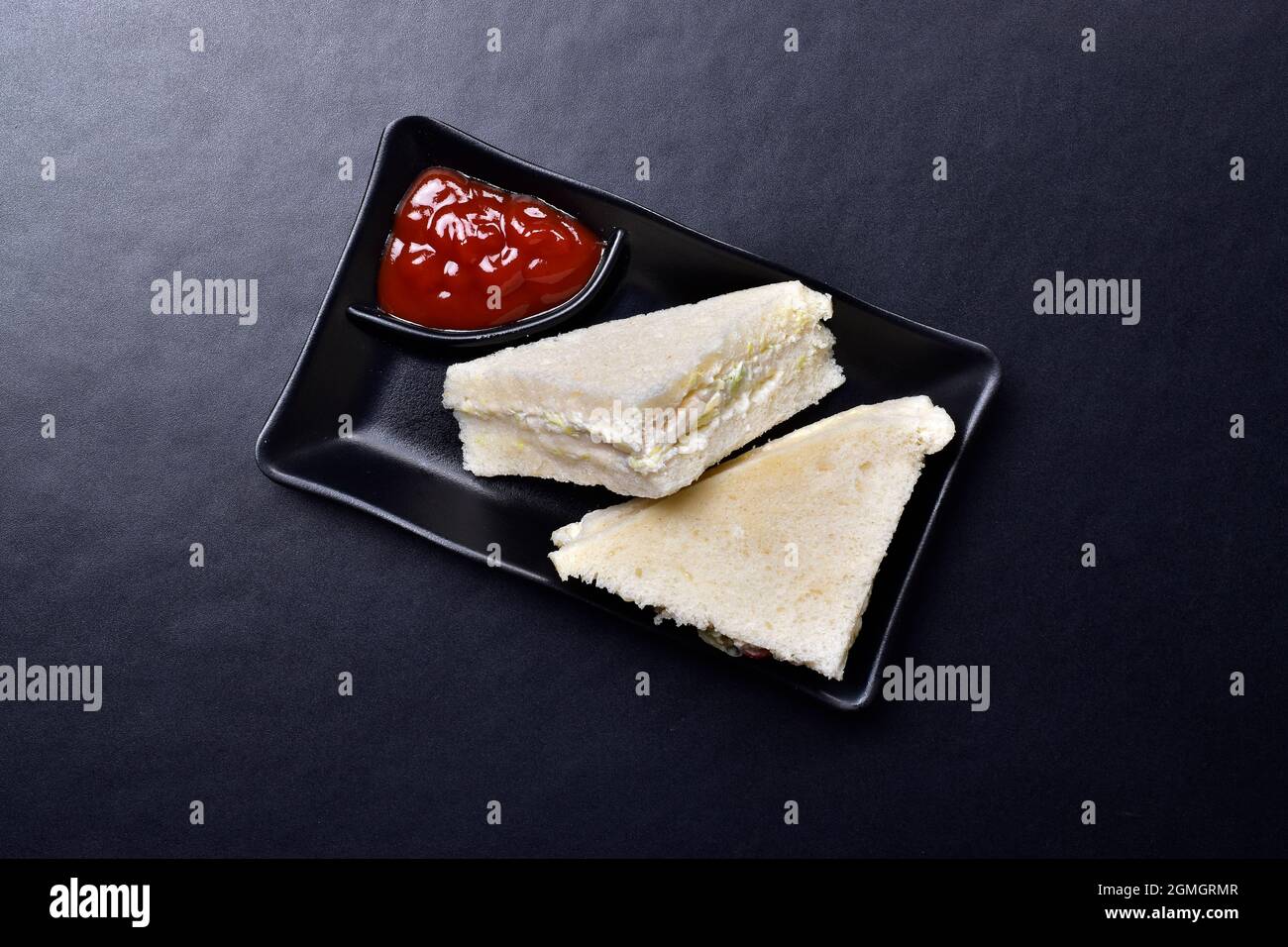 White Bread Sandwich Served with Ketchup Stock Photo