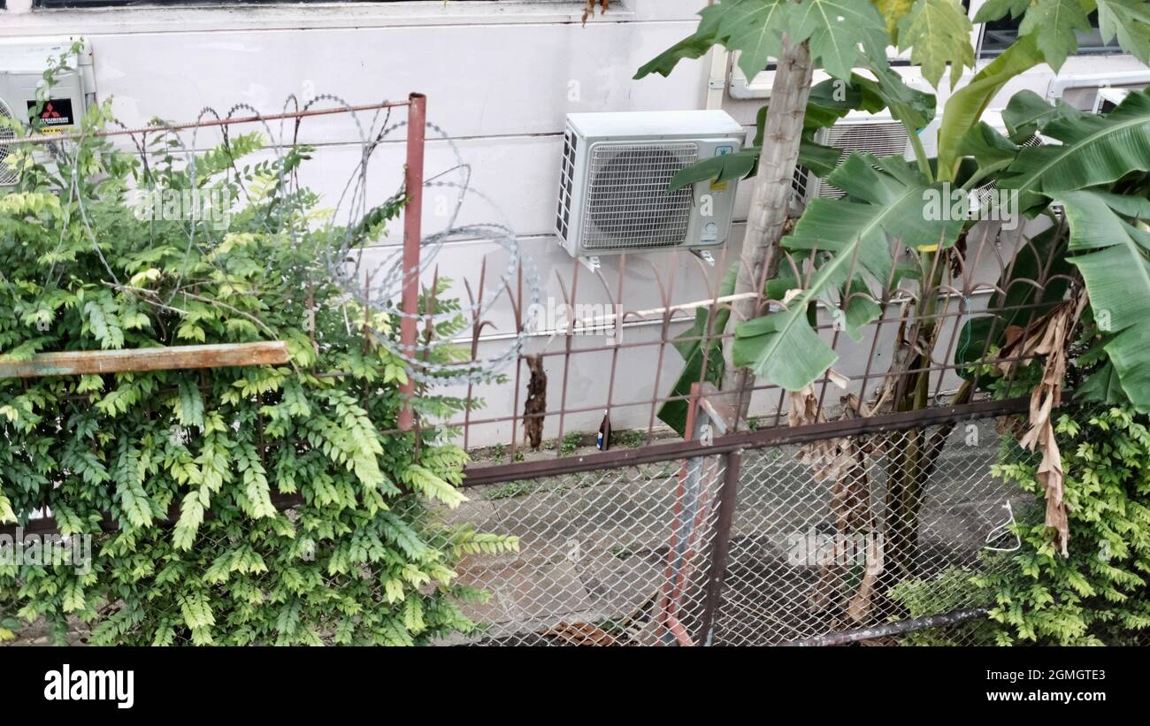 Razor wire and dangerous picket fence closed off on Soi Chit Lom ...