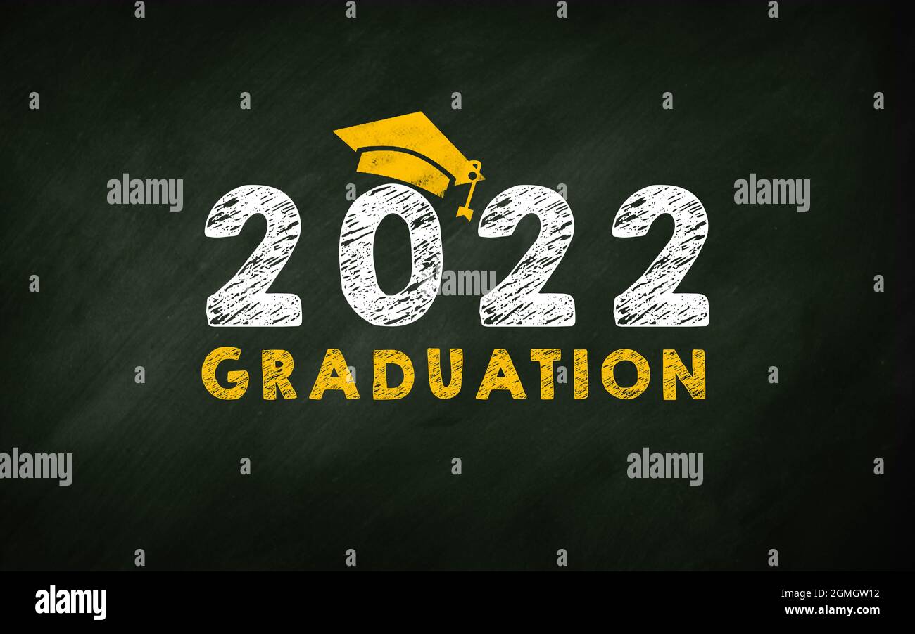 2022 Graduation On Green Chalk With High School Student Hat Icon in Chalkboard. 2022 Students Graduations and Celebration Creative Concept Stock Photo