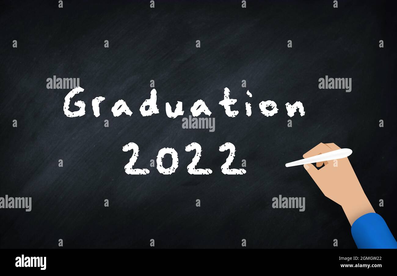 Graduation 2022 Chalkboard . Lettering hand writing text On a School Chalk Board. Students graduation in 2022 concept Stock Photo
