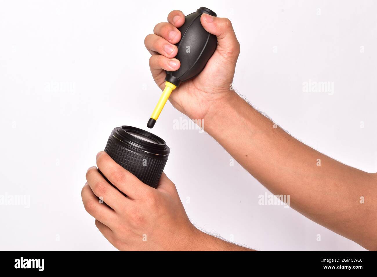 Blowing Air in Camera Lens and Removing Dust Stock Photo Alamy