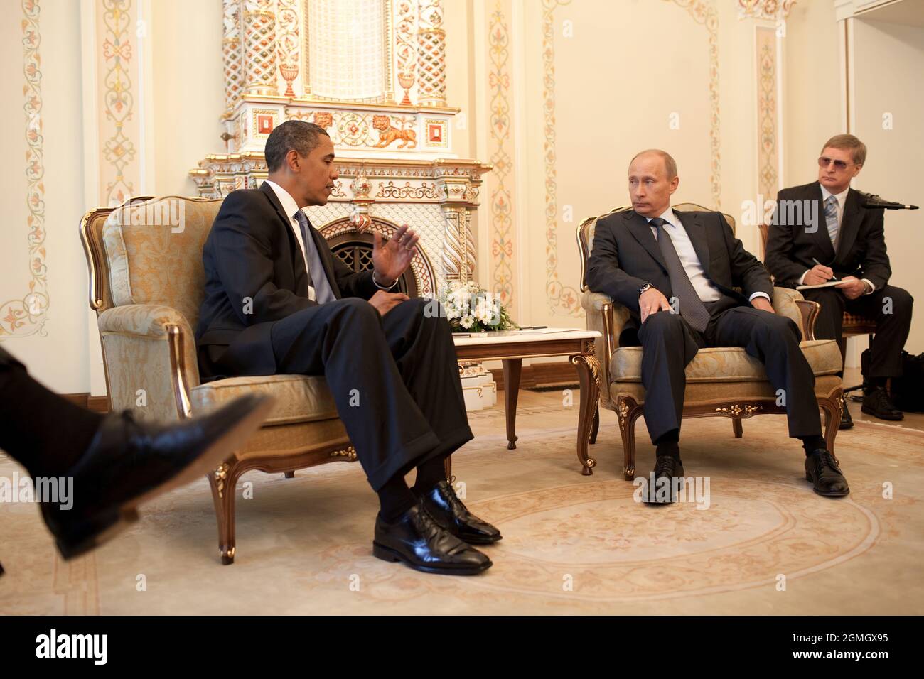 President Barack Obama meets with Prime Minister Vladimir Putin at his dacha outside Moscow, Russia, July 7, 2009.   (Official White House Photo by Pete Souza)This official White House photograph is being made available for publication by news organizations and/or for personal use printing by the subject(s) of the photograph. The photograph may not be manipulated in any way or used in materials, advertisements, products, or promotions that in any way suggest approval or endorsement of the President, the First Family, or the White House. Stock Photo