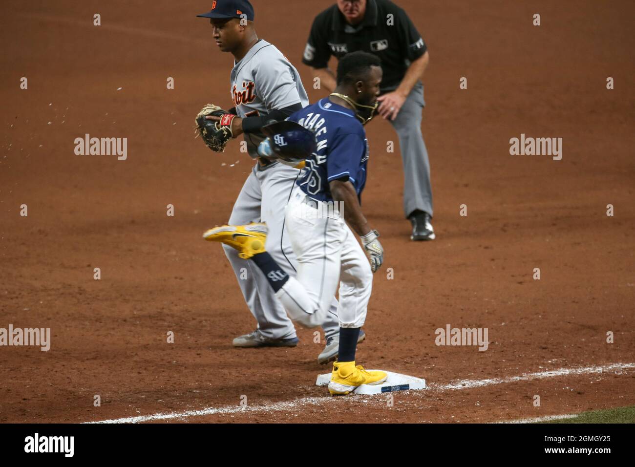 St. Petersburg, FL. USA;  Tampa Bay Rays left fielder Randy Arozarena (56) is thrown out at first in the bottom of the eighth inning during a major le Stock Photo