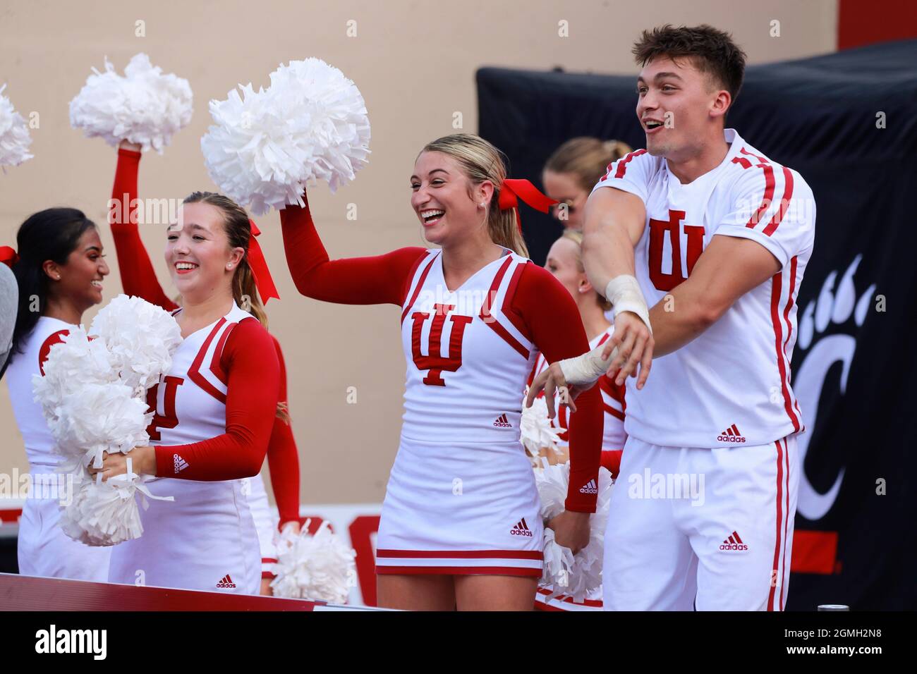 Bloomington, United States. 18th Sep, 2021. Indiana University cheerleaders cheer after the Hoosiers scored a touchdown against University of Cincinnati during an NCAA football game at Memorial Stadium. IU lost to Cincinnati 38-24. Credit: SOPA Images Limited/Alamy Live News Stock Photo