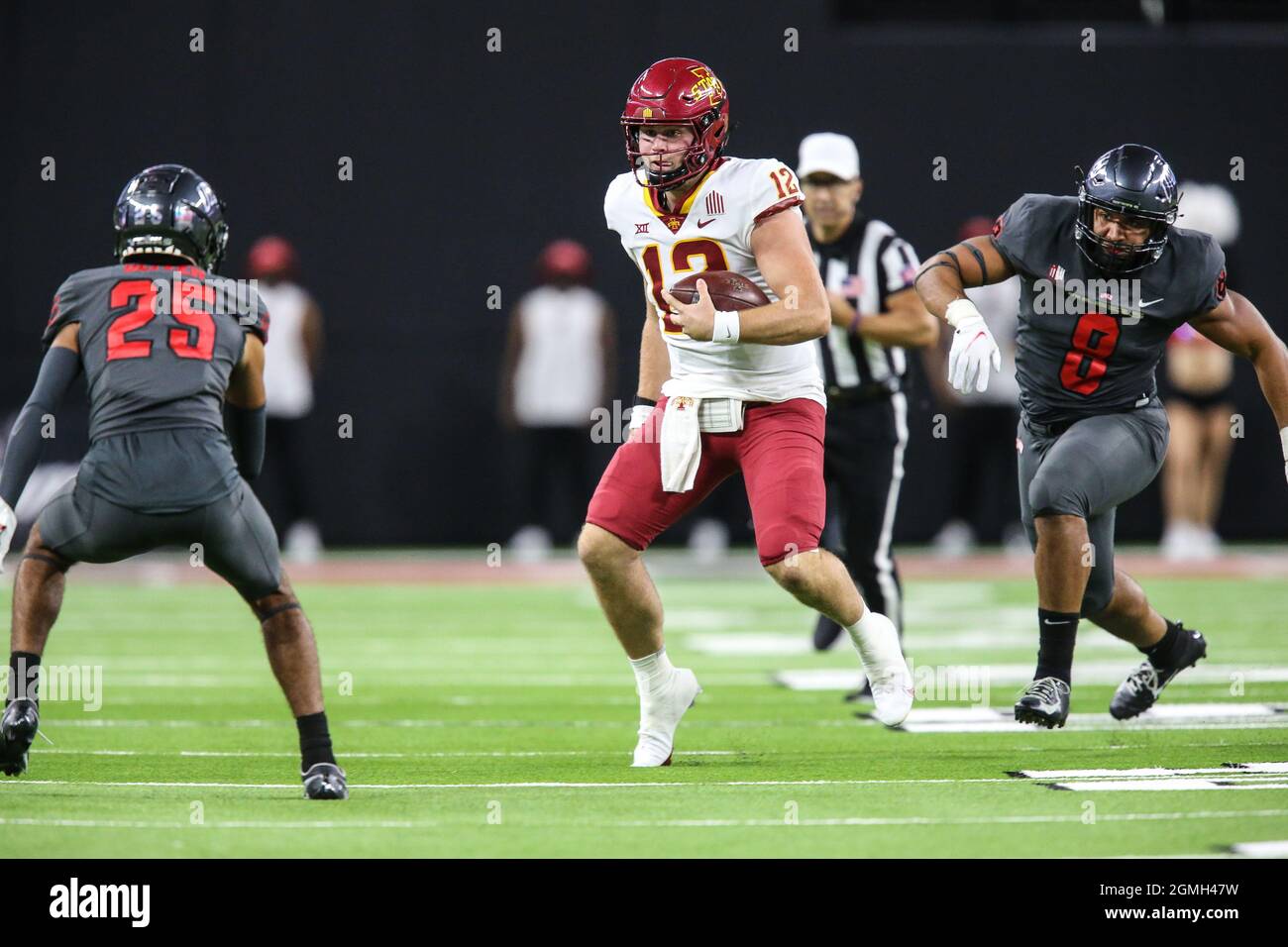 Las Vegas, NV, USA. 18th Sep, 2021. Iowa State Cyclones quarterback Hunter Dekkers (12) runs with the football during the NCAA football game featuring the Iowa State Cyclones and the UNLV Rebels at Allegiant Stadium in Las Vegas, NV. The Iowa State Cyclones defeated the UNLV Rebels 48 to 3. Christopher Trim/CSM/Alamy Live News Stock Photo