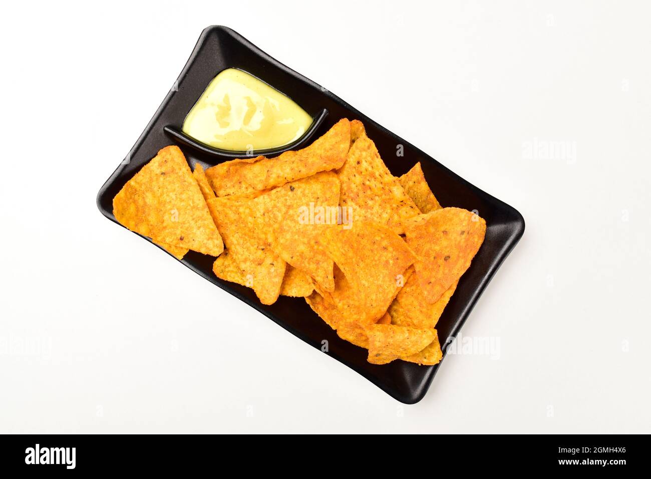 Top View of Nachos in Plate Isolated on White Background with Clipping Path Stock Photo