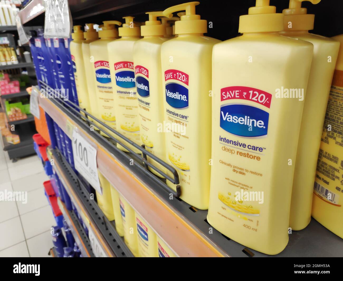 New Delhi, India, 07 December 2020:- Vaseline body lotion on Supermarket Shelf in India Stock Photo